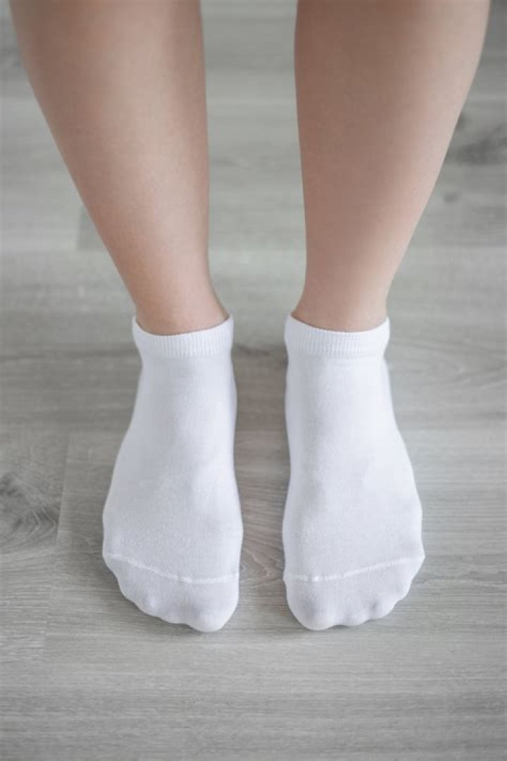 Is white socks better for your feet?